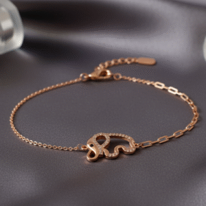 Delicate and full of charm, the Elefleur Bracelet is a celebration of strength wrapped in elegance. Featuring a dainty elephant motif encrusted with fine cubic zirconia, this rose-gold finish piece brings a touch of whimsy to your everyday style. Perfect for layering or wearing solo, it’s a subtle reminder of grace, luck, and gentle power.