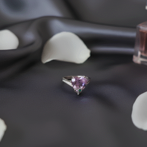 A romantic heart-shaped purple solitaire 💜 with a subtle green accent 💚 — the perfect blend of passion and freshness.